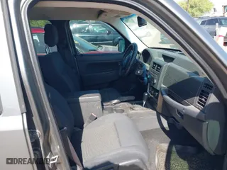 2012 Jeep Liberty Sport with VIN 1C4PJLAK7CW147270, listed as a IAAI auction lot 42016050 with 166,583 mi miles. Bid and sale history available at carsss.com. Image 5.