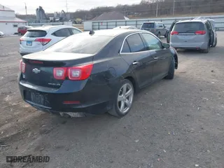 2014 Chevrolet Malibu LTZ with VIN 1G11J5SX4EF173347, listed as a IAAI auction lot 41345183 with 119,080 mi miles. Bid and sale history available at carsss.com. Image 4.