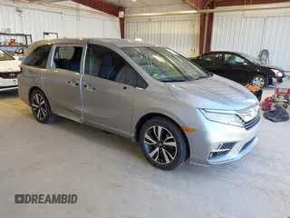 2018 Honda Odyssey Elite z VIN 5FNRL6H95JB105236, wystawiony jako IAAI lot #42020212 z przebiegiem 83 751 mil mil oraz . Historia ofert i sprzedaży dostępna na DreamBid. Obrazek 1.