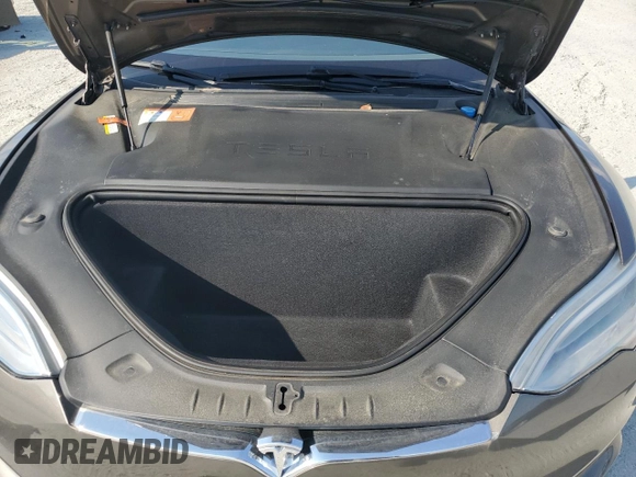 2017 Tesla Model S 100D z VIN 5YJSA1E2XHF173740, wystawiony jako Copart lot #62233125 z przebiegiem 73 932 mil mil oraz Szkoda całkowita • Salvage title. Historia ofert i sprzedaży dostępna na DreamBid. Obrazek 11.
