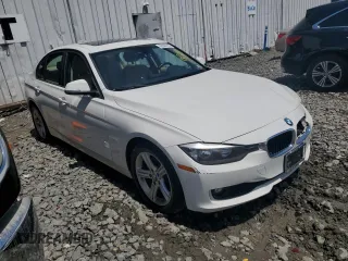 2014 BMW 3 Series 320i xDrive with VIN WBA3C3C51EF983592, listed as a Copart auction lot 60608765 with 195,061 mi miles and Salvage title. Bid and sale history available at DreamBid. Image 4.