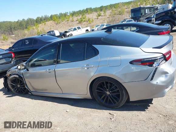 2022 Toyota Camry TRD with VIN 4T1KZ1AK8NU061810, listed as a IAAI auction lot 41769584 with 79,709 mi miles and . Bid and sale history available at DreamBid. Image 14.