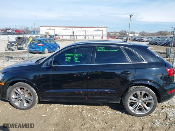 2016 Audi Q3 Premium Plus with VIN WA1EFCFS1GR011801, listed as a IAAI auction lot 41691273 with 126,554 mi miles. Bid and sale history available at carsss.com. Image 14.