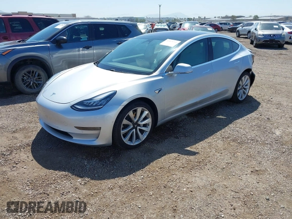 2018 Tesla Model 3 Long Range Battery with VIN 5YJ3E1EB5JF100578, listed as a IAAI auction lot 41959766 with 57,931 mi miles and . Bid and sale history available at DreamBid. Image 2.