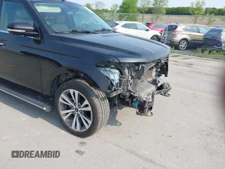 2021 Ford Expedition Max Limited with VIN 1FMJK2AT8MEA74337, listed as a IAAI auction lot 42389166 with 148,996 mi miles and . Bid and sale history available at DreamBid. Image 19.