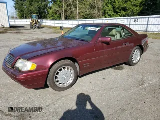 1997 Mercedes-Benz SL-Class with VIN WDBFA67F4VF148157, listed as a Copart auction lot 51943445 with 0 mi miles and Salvage Title. Bid and sale history available at carsss.com. Image 1.