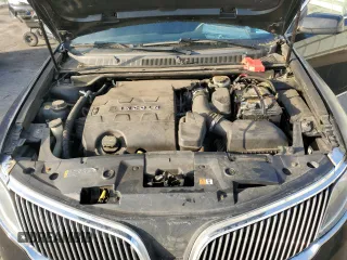 2016 Lincoln MKS z VIN 1LNHL9DK6GG601968, wystawiony jako Copart lot #43110935 z przebiegiem 304 439 mil mil oraz Szkoda całkowita • Salvage title. Historia ofert i sprzedaży dostępna na DreamBid. Obrazek 11.