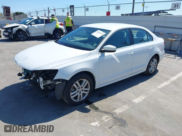 2017 Volkswagen Jetta S with VIN 3VW2B7AJ0HM356506, listed as a IAAI auction lot 42687156 with 96,962 mi miles and . Bid and sale history available at DreamBid. Image 2.