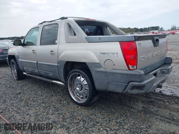 2004 Chevrolet Avalanche Z71 with VIN 3GNEK12T24G147409, listed as a IAAI auction lot 41843423 with 265,742 mi miles. Bid and sale history available at carsss.com. Image 3.