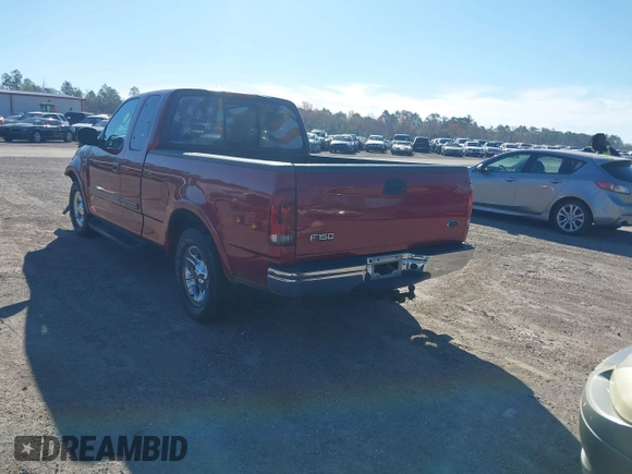 2002 Ford F-150 XL with VIN 1FTRX17W62NB13010, listed as a IAAI auction lot 41689466 with 208,160 mi miles. Bid and sale history available at carsss.com. Image 3.