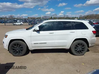 2017 Jeep Grand Cherokee Laredo with VIN 1C4RJFAG9HC824883, listed as a IAAI auction lot 41876117 with 141,067 mi miles. Bid and sale history available at carsss.com. Image 14.