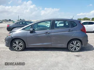 2019 Honda Fit EX with VIN 3HGGK5H87KM735382, listed as a IAAI auction lot 41972963 with 119,006 mi miles and . Bid and sale history available at DreamBid. Image 14.