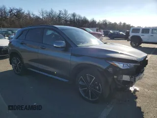 2023 Infiniti QX50 Sport with VIN 3PCAJ5FB6PF113227, listed as a Copart auction lot 84563144 with 7,465 mi miles and Salvage Title. Bid and sale history available at DreamBid. Image 4.