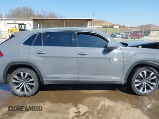 2023 Volkswagen Atlas SEL Premium R-Line с VIN 1V2FE2CA6PC206412, выставлен на аукционе IAAI как лот 41801027 с пробегом 64 898 миль миль и . История ставок и продаж доступна на DreamBid. Изображение 14.