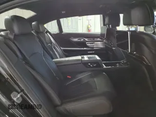2016 BMW 7 Series 750i with VIN WBA7F0C5XGGL99017, listed as a Copart auction lot 84934504 with 0 mi miles and Salvage Title. Bid and sale history available at carsss.com. Image 11.