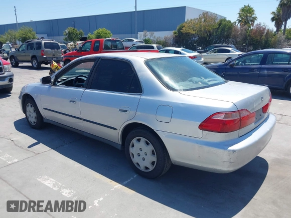 1999 Honda Accord LX with VIN JHMCG665XXC033464, listed as a IAAI auction lot 42687150 with 194,076 mi miles and . Bid and sale history available at DreamBid. Image 3.
