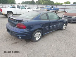 2001 Pontiac Grand Am with VIN 1G2NE12T11M633383, listed as a IAAI auction lot 42505148 with 107,037 mi miles and . Bid and sale history available at DreamBid. Image 4.