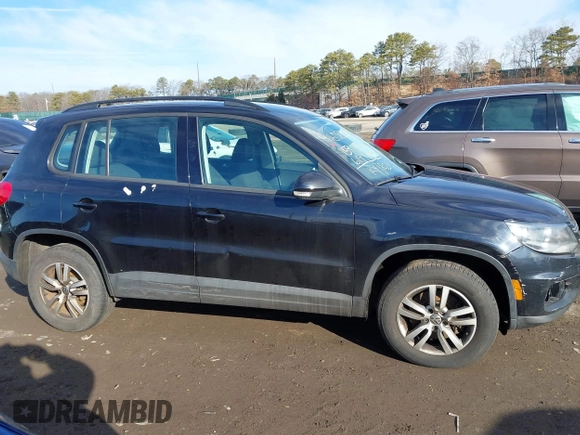 2015 Volkswagen Tiguan SE z VIN WVGAV7AX2FW593453, wystawiony jako IAAI lot #41658359 z przebiegiem 159 619 mil mil oraz . Historia ofert i sprzedaży dostępna na DreamBid. Obrazek 13.