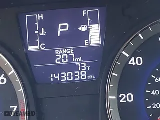 2015 Hyundai Accent GLS with VIN KMHCT4AE8FU833113, listed as a IAAI auction lot 40975977 with 143,038 mi miles. Bid and sale history available at carsss.com. Image 7.