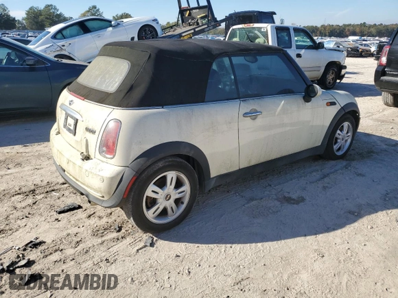 2007 MINI Convertible with VIN WMWRF33507TF67302, listed as a Copart auction lot 82853344 with Not Provided miles and Clean Title. Bid and sale history available at DreamBid. Image 3.