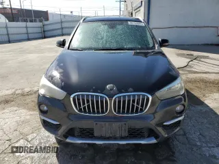 2017 BMW X1 sDrive28i z VIN WBXHU7C34HP924632, wystawiony jako Copart lot #56169005 z przebiegiem 203 811 mil mil oraz Czysty tytuł • Clean title. Historia ofert i sprzedaży dostępna na DreamBid. Obrazek 5.
