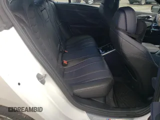 2020 BMW 8 Series M850i z VIN WBAGV8C01LBP48692, wystawiony jako Copart lot #52019305 z przebiegiem Nie podano mil oraz Szkody całkowita. Historia ofert i sprzedaży dostępna na DreamBid. Obrazek 11.