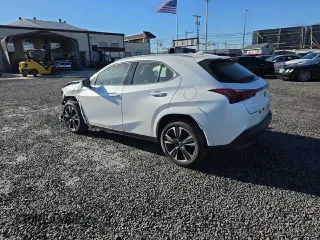 2023 Lexus UX 250h Premium with VIN JTHP9JBH5P2067865, listed as a Copart auction lot 48177135 with 26,139 mi miles and Salvage Title. Bid and sale history available at DreamBid. Image 2.