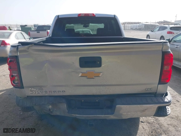 2014 Chevrolet Silverado 1500 LTZ with VIN 3GCUKSEC3EG273544, listed as a IAAI auction lot 41780391 with 125,135 mi miles. Bid and sale history available at carsss.com. Image 16.