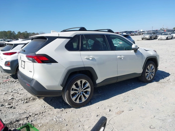 2021 Toyota RAV4 XLE Premium with VIN 2T3C1RFV0MW127432, listed as a IAAI auction lot 41646469 with 28,594 mi miles. Bid and sale history available at carsss.com. Image 4.
