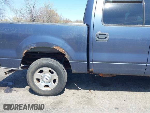 2004 Ford F-150 XLT with VIN 1FTRW14W24KA27415, listed as a IAAI auction lot 42081888 with 149,897 mi miles. Bid and sale history available at carsss.com. Image 6.