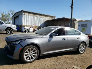 2021 Cadillac CT5 Luxury z VIN 1G6DX5RK1M0126620, wystawiony jako Copart lot #54764945 z przebiegiem 58 449 mil mil oraz Szkody całkowita. Historia ofert i sprzedaży dostępna na DreamBid. Obrazek 1.
