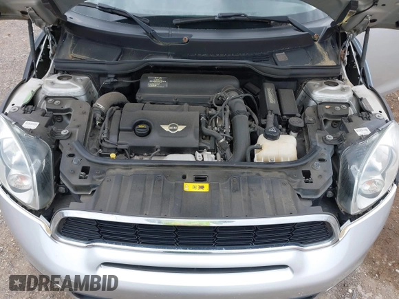 2011 MINI Countryman S with VIN WMWZC5C51BWM10385, listed as a IAAI auction lot 41952679 with 112,008 mi miles and . Bid and sale history available at DreamBid. Image 10.