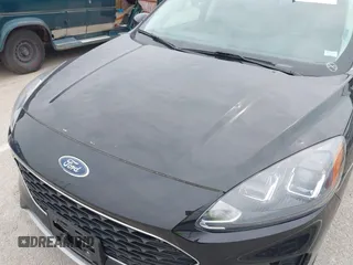 2021 Ford Escape SE z VIN 1FMCU9G6XMUA27362, wystawiony jako IAAI lot #42438771 z przebiegiem 36 040 mil mil oraz . Historia ofert i sprzedaży dostępna na DreamBid. Obrazek 6.
