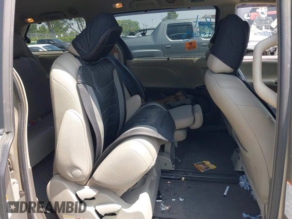2015 Toyota Sienna XLE with VIN 5TDYK3DC4FS560743, listed as a IAAI auction lot 42488745 with 145,009 mi miles and . Bid and sale history available at DreamBid. Image 8.