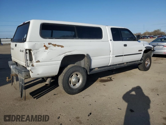 2001 Dodge 2500 z VIN 1B7KF23621J521123, wystawiony jako Copart lot #49670345 z przebiegiem 248 027 mil mil oraz Szkoda całkowita • Salvage title. Historia ofert i sprzedaży dostępna na DreamBid. Obrazek 3.
