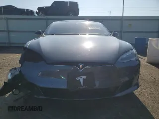 2017 Tesla Model S 100D с VIN 5YJSA1E2XHF185516, выставлен на аукционе Copart как лот 61816135 с пробегом 132 267 миль миль и Списание • Salvage title. История ставок и продаж доступна на DreamBid. Изображение 5.