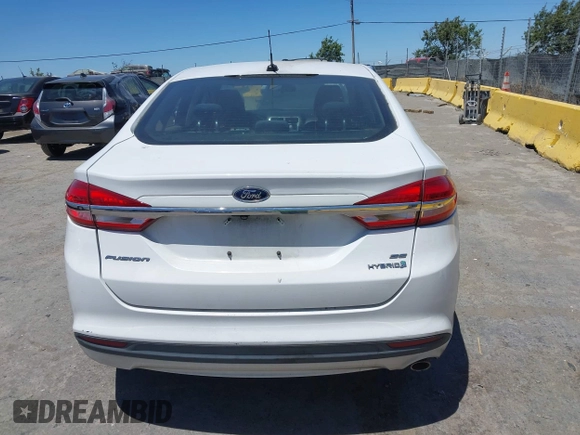 2017 Ford Fusion Hybrid SE with VIN 3FA6P0LU3HR326980, listed as a IAAI auction lot 42692591 with 141,122 mi miles and . Bid and sale history available at DreamBid. Image 16.