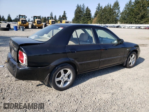 2003 Mazda Protege DX with VIN JM1BJ226231214537, listed as a Copart auction lot 54448615 with 147,753 mi miles and Salvage Title. Bid and sale history available at DreamBid. Image 3.