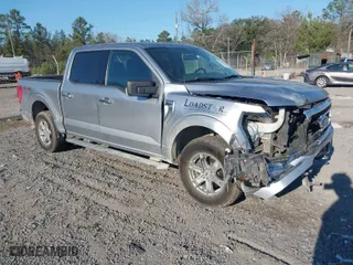 2021 Ford F-150 XL with VIN 1FTFW1E58MFA73753, listed as a IAAI auction lot 41707310 with 138,450 mi miles. Bid and sale history available at carsss.com. Image 1.