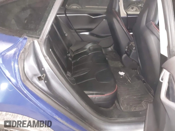 2014 Tesla Model S 60 with VIN 5YJSA1H1XEFP30497, listed as a IAAI auction lot 41294630 with 203,663 mi miles and . Bid and sale history available at DreamBid. Image 8.