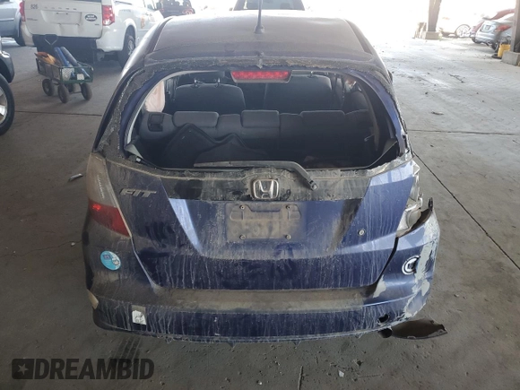2009 Honda Fit with VIN JHMGE872X9S036722, listed as a Copart auction lot 64701315 with 197,305 mi miles and Non repairable. Bid and sale history available at DreamBid. Image 6.
