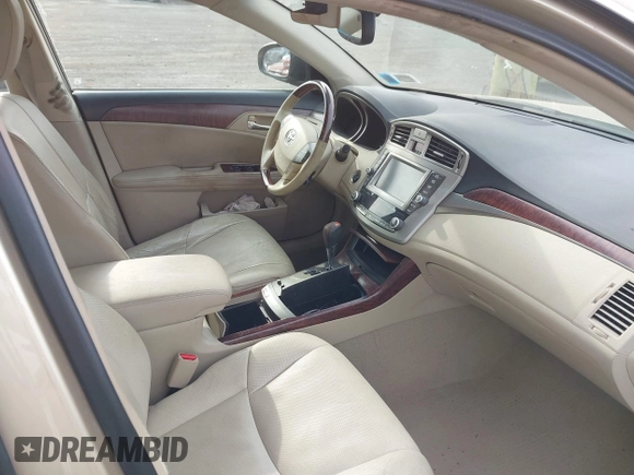 2011 Toyota Avalon with VIN 4T1BK3DB5BU414687, listed as a IAAI auction lot 42103830 with 130,045 mi miles and . Bid and sale history available at carsss.com. Image 5.