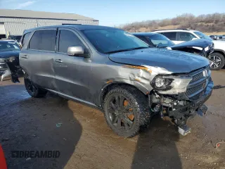 2012 Dodge Durango R/T with VIN 1C4SDHCT3CC188243, listed as a Copart auction lot 40917114 with 145,409 mi miles and Salvage title. Bid and sale history available at DreamBid. Image 4.