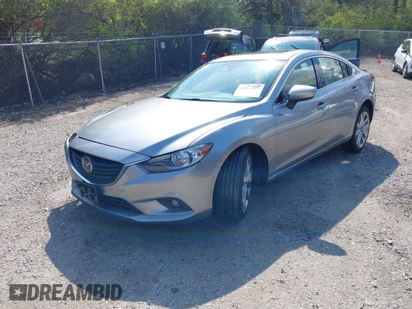 2015 Mazda 6 i Grand Touring with VIN JM1GJ1W52F1195333, listed as a IAAI auction lot 42014865 with 107,039 mi miles and . Bid and sale history available at DreamBid. Image 2.