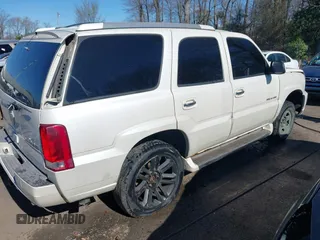 2005 Cadillac Escalade z VIN 1GYEK63N45R152595, wystawiony jako IAAI lot #41823123 z przebiegiem 163 157 mil mil oraz . Historia ofert i sprzedaży dostępna na DreamBid. Obrazek 4.