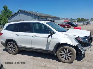 2021 Honda Pilot EX-L z VIN 5FNYF6H51MB058615, wystawiony jako IAAI lot #42657151 z przebiegiem 95 498 mil mil oraz . Historia ofert i sprzedaży dostępna na DreamBid. Obrazek 13.