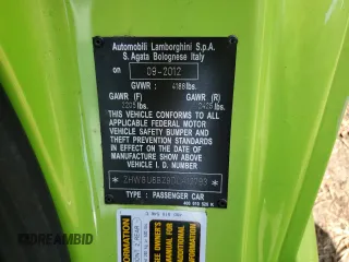 2013 Lamborghini Gallardo z VIN ZHWGU6BZ9DLA12793, wystawiony jako Copart lot #77525804 z przebiegiem 11 777 mil mil oraz Szkody całkowita. Historia ofert i sprzedaży dostępna na DreamBid. Obrazek 13.