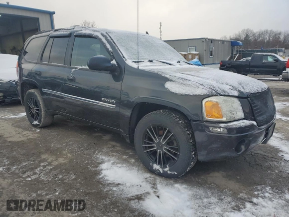 2006 GMC Envoy SLT with VIN 1GKDT13S562338202, listed as a Copart auction lot 87326504 with 158,468 mi miles and Clean Title. Bid and sale history available at carsss.com. Image 4.