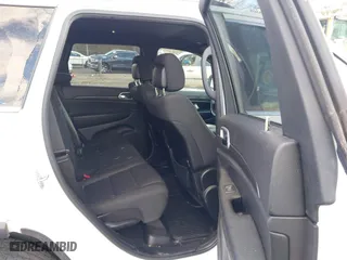 2018 Jeep Grand Cherokee Laredo E with VIN 1C4RJFAG8JC424609, listed as a IAAI auction lot 41124689 with 101,643 mi miles. Bid and sale history available at carsss.com. Image 8.