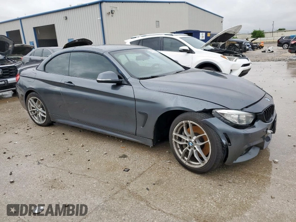 2015 BMW 4 Series 435i xDrive with VIN WBA3T7C54FP942778, listed as a Copart auction lot 54515685 with 128,423 mi miles and Salvage title. Bid and sale history available at DreamBid. Image 4.